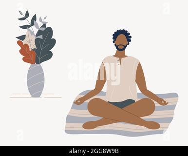 afroamerikanischer Mann, der mit gekreuzten Beinen auf dem Boden sitzt und meditiert. Junger Mann in Yogahaltung, der Meditation, Achtsamkeitspraxis, spirituell macht Stockfoto