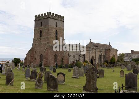 St. Aidans Kirche und Friedhof in Bamburgh, Northumberland, England. Stockfoto