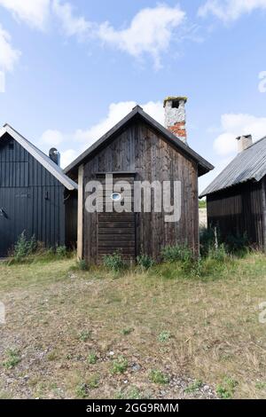 Alte Fischerhütten in Helgumannen, einem alten Fischerdorf auf Fårö, Schweden Stockfoto