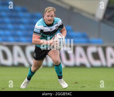 Jordan Johnstone (14) vom Hull FC läuft mit dem Ball nach vorne Stockfoto