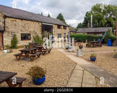 The Old Dairy Farm Craft Center, Upper Stowe, Northamptonshire, Großbritannien; Geschäfte, Galerien und Künstlerstudios in alten umgebauten Bauernhäusern. Stockfoto