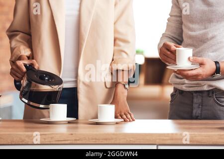 Leute, die eine Kaffeepause im Büro haben Stockfoto