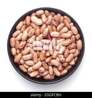 Makro-Nahaufnahme von Bio-Lobia, ( Lobia ) oder Kidney Beans dal auf einer schwarzen Keramikschale. Draufsicht Stockfoto