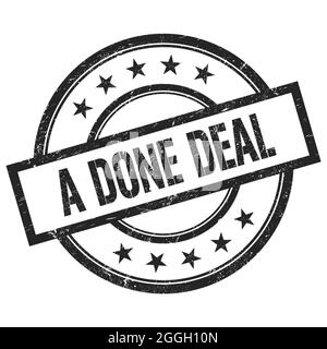 Ein FERTIG GEFASSTER DEAL Text auf schwarzem runden Vintage-Stempel geschrieben. Stockfoto