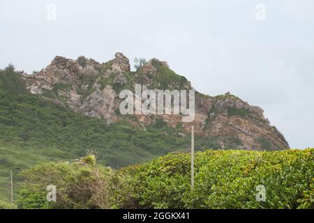 Eine Gesteinsformation, die an der Ostküste von Barbados gefunden wurde und als „schlafender Riese“ bezeichnet wird Stockfoto