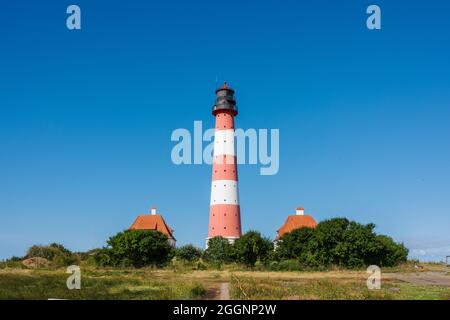 Der Leuchtturm von Westerhever im Wattenmeer auf der Halbinsel Eiderstedt Stockfoto