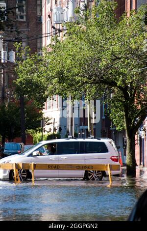 Straßenüberflutung durch Hurriam Ida Regen in Hoboken, New Jersey, USA. Stockfoto