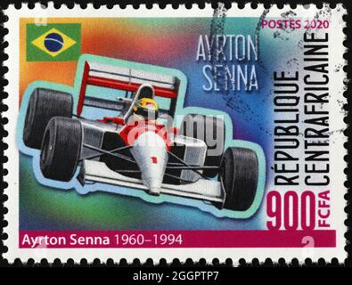 Ayrton Senna fährt mit seinem McLaren auf Briefmarke Stockfoto