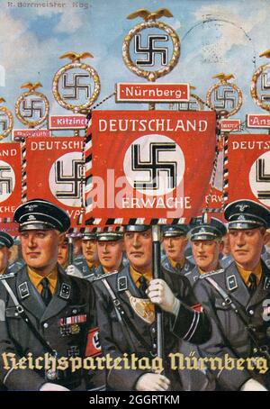 Ein Vintage-Plakat für die jährliche Nazi-Nürnberger Kundgebung, auf dem die SS mit Standards marschiert Stockfoto