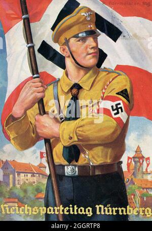 Ein Vintage-Plakat zur jährlichen Nazi-Nürnberger Kundgebung mit einem uniformierten Mitglied der Hitler-Jugend (HJ) Stockfoto