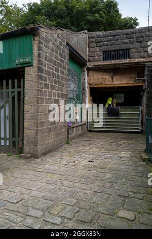 Überreste der 1860 in Heptonstall zusammengeschlossenen Genossenschaft, die später mit Hebden Bridge, einer historischen viktorianischen Konsumgesellschaft, verschmolzen wurde Stockfoto