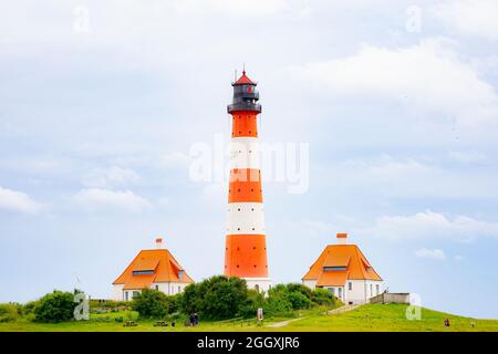 Der Westerhevers Leuchtturm, der 1908 erbaut wurde, befindet sich in Westerhever. Aufgenommen in Schleswig-Holstein, Deutschland am 17. Juli 2016 Stockfoto