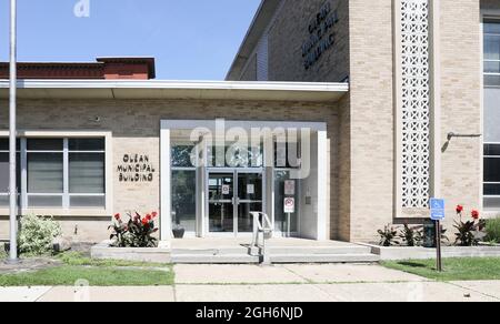 OLEAN, NY, USA-14. AUGUST 2021: Gebäude der Stadt Olean, Eingang und Schild. Stockfoto