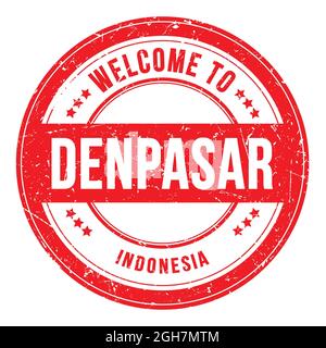 WILLKOMMEN IN DENPASAR - INDONESIEN, Worte geschrieben auf roter runder Münzmarke Stockfoto