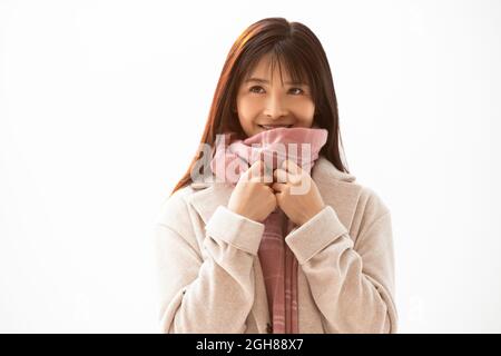 Studioaufnahme einer glücklichen jungen Frau Stockfoto