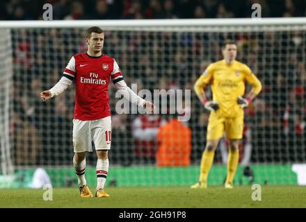 Jack Wilshere von Arsenal sieht depriziert aus, nachdem er während der UEFA Champions League-Runde von 16, dem First Leg-Spiel zwischen Arsenal und Bayern München, am 19. Februar 2013 im Emirates Stadium in London, Großbritannien, um 3-1:00 Uhr gefallen ist. Stockfoto