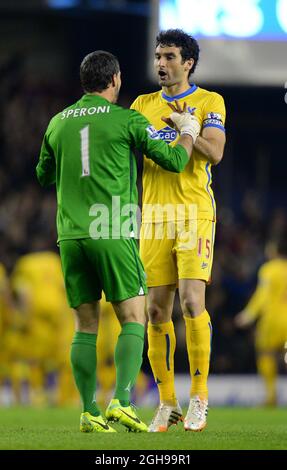 Julian Speroni und Mile Jedinak von Crystal Palace feiern am 16. April 2014 das dritte Tor beim Barclays Premier League-Spiel zwischen Everton und Crystal Palace im Goodison Park Stadium in Liverpool, Großbritannien. Stockfoto