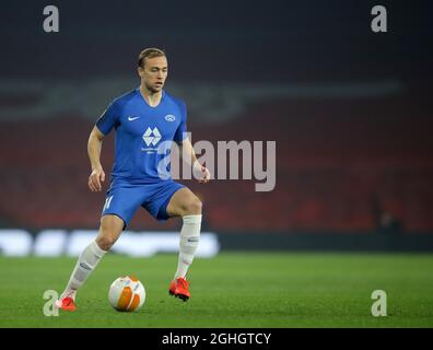 BUDAPEST, HUNGARY - SEPTEMBER 29: (l-r) Oleksandr Zubkov of Ferencvarosi TC  and Somalia of Ferencvarosi TC fights for the ball with Martin Ellingsen of  Molde FK during the UEFA Champions League Play-Offs