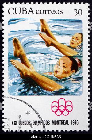 KUBA - UM 1976: Eine in Kuba gedruckte Marke zeigt Schwimmen, Olympische Sommerspiele 1976, Montreal, um 1976 Stockfoto