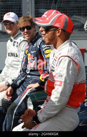 Michael Schumacher (GER), Mercedes AMG Petronas mit Jenson Button (GBR), McLaren Mercedes, Sebastian Vettel (GER), Red Bull Racing und Lewis Hamilton (GBR), McLaren Mercedes 18.03.2012. Formel-1-Weltmeisterschaft, Rd 1, Großer Preis Von Australien, Melbourne, Australien, Sonntag - ‚ Copyright: Batchelor / XPB Images Stockfoto