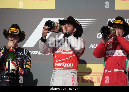 1. Platz Lewis Hamilton (GBR), McLaren Mercedes 2. Platz Sebastian Vettel (GER), Red Bull Racing und 3. Platz Fernando Alonso (ESP), Scuderia Ferrari 18.11.2012. Formel-1-Weltmeisterschaft, Rd 19, großer Preis der Vereinigten Staaten, Austin, USA, Wettkampftag Stockfoto