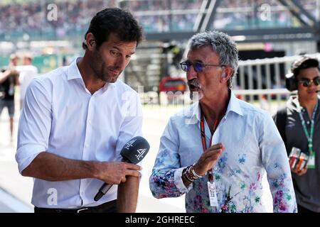 (L bis R): Mark Webber (AUS) Channel 4 Presenter mit Eddie Jordan (IRE). 07.07.2018. Formel-1-Weltmeisterschaft, Rd 10, Großer Preis Von Großbritannien, Silverstone, England, Qualifizierender Tag. Bildnachweis sollte lauten: XPB/Press Association Images. Stockfoto