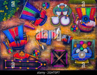 Webprozess, Gemälde aus der Vogelperspektive, San Juan La Laguna, Lake Atitlan, San Juan La Laguna, Guatemala Stockfoto