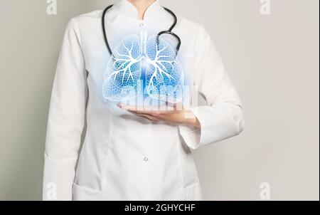 Lunge gibt medizinisches Konzept heraus. Foto einer Ärztin, leerer Raum. Stockfoto