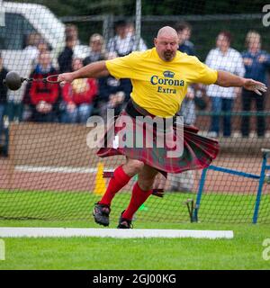 Hammerwerfen bei der Cowal Gathering. Eine traditionelle Highland Games, die jedes Jahr in Dunoon in Schottland stattfinden. Stockfoto