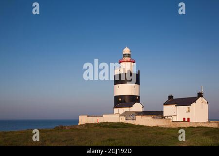 Irland, County Wexford, Hook Halbinsel, Hook Head, Hook Head LIghthouse, dawn Stockfoto