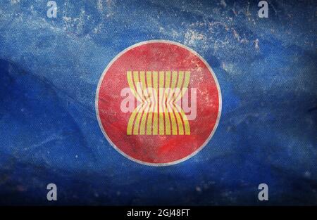 Minsk, Weißrussland - Mai, 2021: Flagge der Vereinigung südostasiatischer Nationen, ASEAN winkt im Wind am Fahnenmast vor dem Hintergrund des blauen Himmels. 3d-Grafik Stockfoto