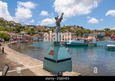 Christ of the Deep ist eine Statue auf der Carenage gegenüber der Bucht. Es ist ein Denkmal für die Bianca C, die in einem Feuer versunken ist. Grenada, St. George's. C Stockfoto