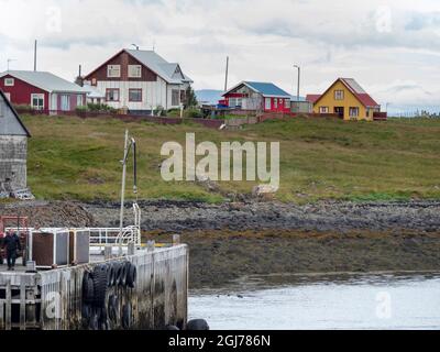 Insel Flatey in Breidafjordur zwischen Westfjorden und Snaefellsnes. Dorf Stykkisholmur auf der Halbinsel Snaefellsnes im Westen Islands. (Redaktionelle Verwendung Stockfoto