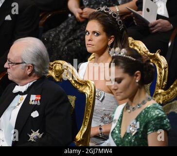 STOCKHOLM 20121210 König Carl Gustaf, Prinzessin Madeleine und Kronprinzessin Victoria bei der Verleihung des Nobelpreises in der Stockholmer Konzerthalle, 10. dezember 2012. Foto Henrik Montgomery / SCANPIX kod 10060 Stockfoto