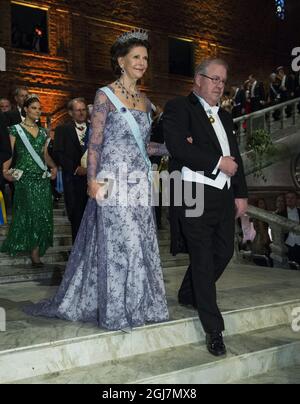 STOCKHOLM 2012-12-10 Königin Silvia und Marcus Storch, Vorsitzender der Nobel Foundation, treffen am 10. Dezember 2012 beim Nobelbankett im Rathaus in Stockholm ein. Foto Claudio Bresciani / SCANPIX Code 10090 Stockfoto