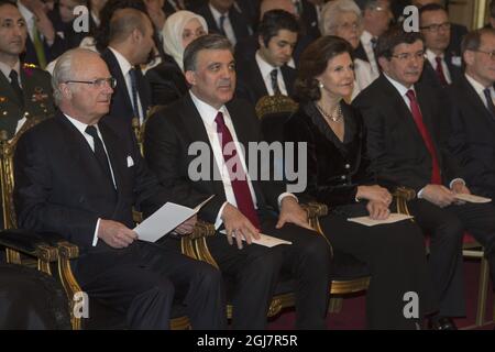 STOCKHOLM 20130312 von links nach rechts: Schwedens König Carl Gustaf, der türkische Präsident Abdullah GÃ¼l, Schwedens Königin Silvia und der türkische Außenminister Ahmet Davutoglu nehmen am 12. März 2013 an einem Konzert des turskischen Präsidentenpaares im Grand Hotel in Stockholm Teil. Foto: Leif R Jansson / SCANPIX / Code 10020 Stockfoto