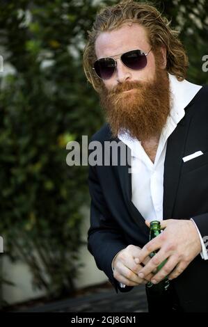 CANNES 2014-05-18 der norwegische Schauspieler Kristofer Hivju wird während einer Fotosession während der Filmfestspiele von Cannes am 18. Mai 2014 in Frankreich gesehen. Hivju spielt OstlundÂ´s dem Film Â „Force Majeure“ des schwedischen Regisseurs Ruben, der während des Festivals in der Sektion „UN Certain Regard“ gegeneinander antreten wird. Foto Pontus Lundahl / TT / kod 10050 Stockfoto