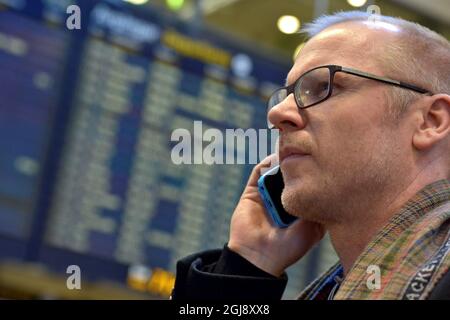 ARLANDA 20141209 die Polizei ermittelt am Dienstag, den 9 2014. Dezember, eine mutmaßliche Bombendrohung auf dem Flughafen Arlanda nördlich von Stockholm, Schweden. Nach Angaben der Polizei ist die Bedrohung gegen einen bestimmten Flug und die Tore am Terminal 5 wurden abgesperrt. Foto: Johan Nilsson / TT kod 50090 Stockfoto
