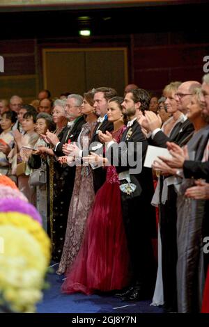 STOCKHOLM 20141210 Prinzessin Christina, Tord Magnusson, , Prinzessin Madeleine, Herr Christopher O'Neill , Sofia Hellqvist und Prinz Carl Philip bei der Nobelpreisverleihung in der Stockholmer Konzerthalle in Stockholm, Schweden, 10. Dezember 2014 Foto: Henrik Montgomery / TT kod10060 Stockfoto