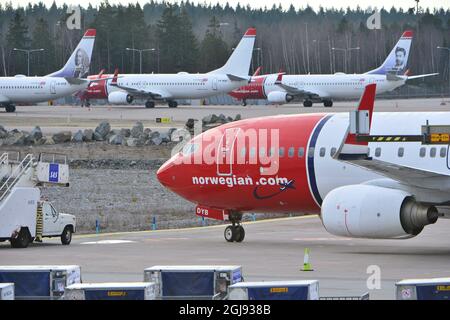 STOCKHOLM 20150305 parkte Boeing 737-800 Flugzeuge der Billigfluggesellschaft Norwegian am 5. März 2015 auf dem Flughafen Stockholm Arlanda. 650 Piloten, die von der Norwegian Air Norway (NAN) beschäftigt sind, sind auf Streikerdungsflügen in Norwegen, Schweden und Dänemark. Foto: Johan Nilsson / TT / ** SCHWEDEN AUS ** Stockfoto