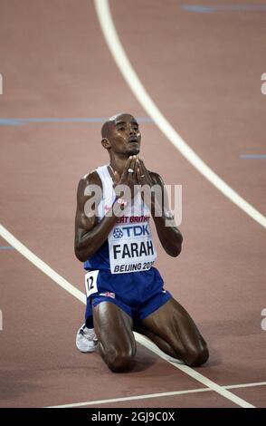 PEKING 20150822 der Brite Mohamed Farah reagierte nach dem Sieg im 10000-Meter-Finale der Männer während der IAAF-Weltmeisterschaft 2015 in Peking im Nationalstadion in Peking, China, am 22. August 2015. Foto: Jessica Gow / TT / Kod 10070 Stockfoto