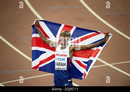 PEKING 20150822 der Brite Mohamed Farah reagierte nach dem Sieg im 10000-Meter-Finale der Männer während der IAAF-Weltmeisterschaft 2015 in Peking im Nationalstadion in Peking, China, am 22. August 2015. Foto: Jessica Gow / TT / Kod 10070 Stockfoto