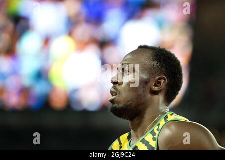 PEKING 20150823 Usain Bolt aus Jamaika nach dem 100-Meter-Halbfinale der Männer bei der IAAF-Weltmeisterschaft 2015 in Peking im Nationalstadion in Peking, China, 23. August 2015. Foto: Jessica Gow / TT / Kod 10070 Stockfoto