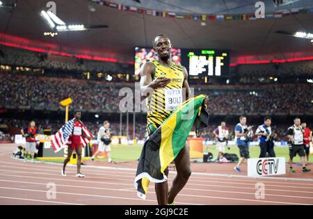 PEKING 20150823 Usain Bolt aus Jamaika nach dem Gewinn des 100-Meter-Finales der Männer während der IAAF-Weltmeisterschaft 2015 in Peking im Nationalstadion in Peking, China, 23. August 2015. Foto: Jessica Gow / TT / Kod 10070 Stockfoto