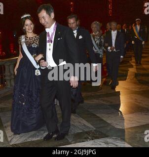 STOCKHOLM 2015-12-10 Prinzessin Sofia und der Physik-Preisträger Takaaki Kajita aus Japan verlassen das Nobelbankett im Rathaus von Stockholm. Foto: Fredrik Sandberg / TT / Kod 10080 Stockfoto