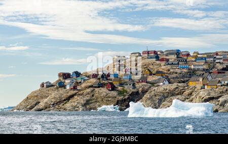 Die Stadt Uummannaq, nordwestlich von Grönland, liegt auf einer Insel im Uummannaq Fjordsystem. Stockfoto