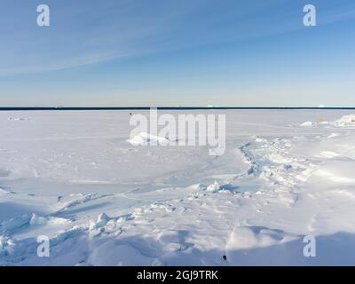 Küstenlandschaft im Winter in der Nähe der Stadt Upernavik im Norden Grönlands am Ufer der Baffin Bay. Dänemark, Grönland Stockfoto