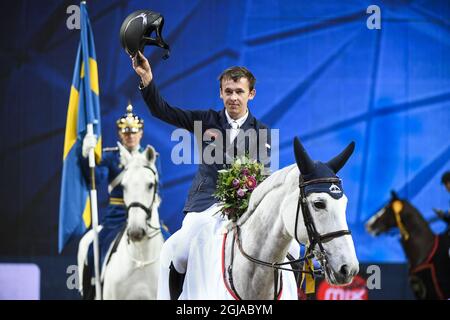 STOCKHOLM 20161127 Bertram Allen aus Irland auf dem Pferd Molly Malone gewinnt das Grand Prix-Springen auf der Sweden International Horse Show in der Friends Arena in Stockholm. Foto: Pontus Lundahl / TT / kod 10050 Stockfoto