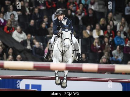 STOCKHOLM 20161127 Bertram Allen aus Irland auf dem Pferd Molly Malone gewinnt das Grand Prix-Springen auf der Sweden International Horse Show in der Friends Arena in Stockholm. Foto: Pontus Lundahl / TT / kod 10050 Stockfoto