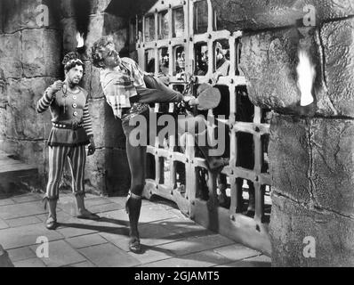 Nick Cravat, Burt Lancaster (Mitte), am Set des Films, „The Flame and the Arrow“, Warner Bros., 1950 Stockfoto